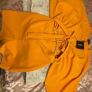 Brand new, size medium shorts, jumpsuit.